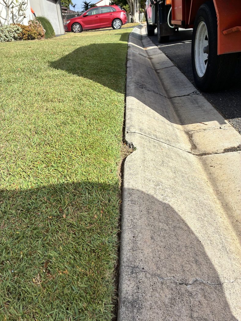 Neatly edged lawn completed by Haider Haiwary